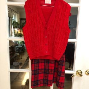 Red wool vest with tiny hole not to be noticed and plaid wool skirt